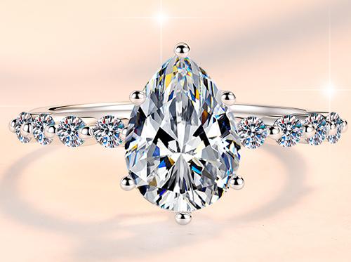 Pear Cut Side Stone Moissanite Ring in 925 Sterling Silver