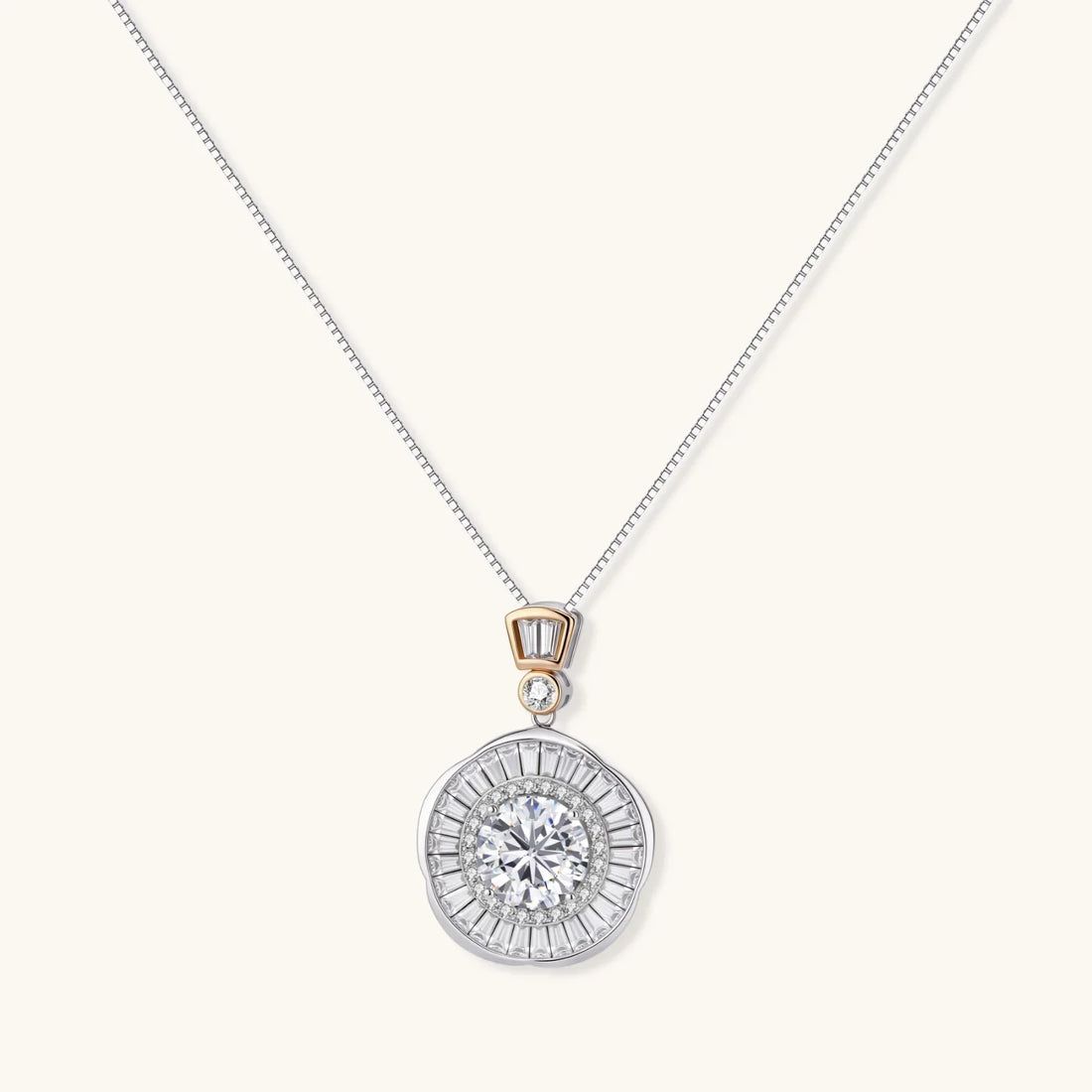 Sterling silver necklace with a circular geometric pendant featuring a central moissanite and radial baguette pattern.