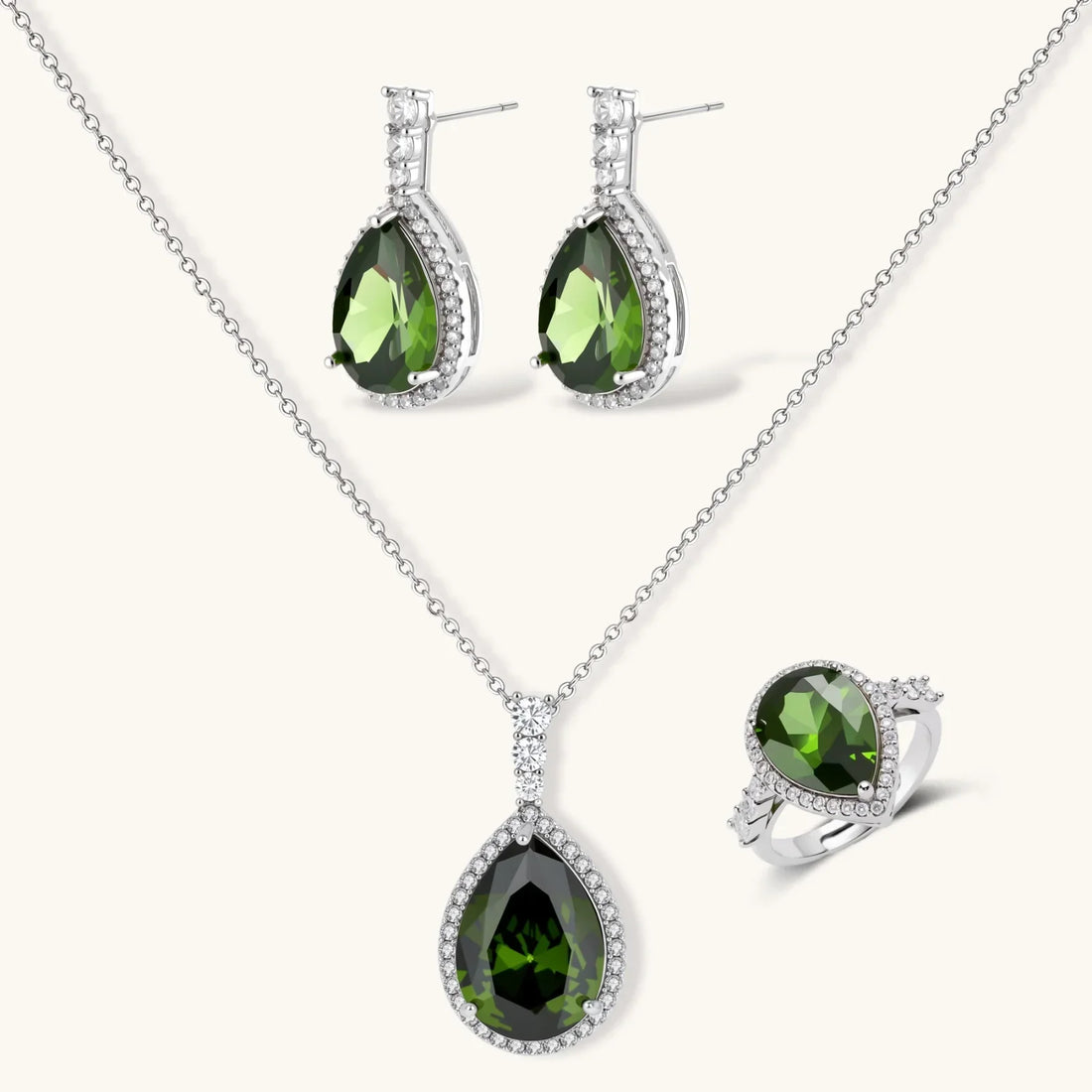 Jewellery set with green teardrop gemstones