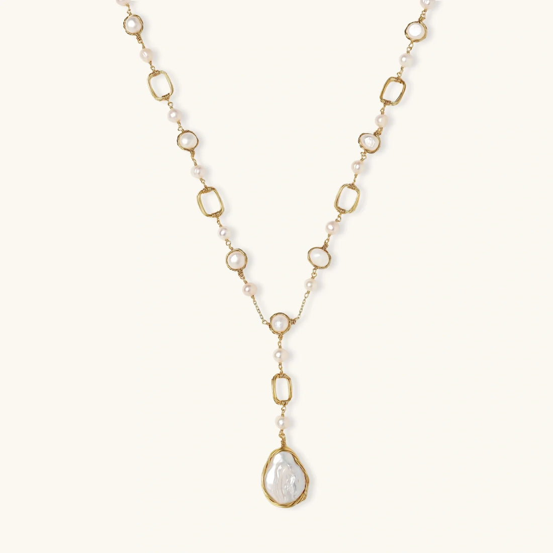 Long pearl station necklace