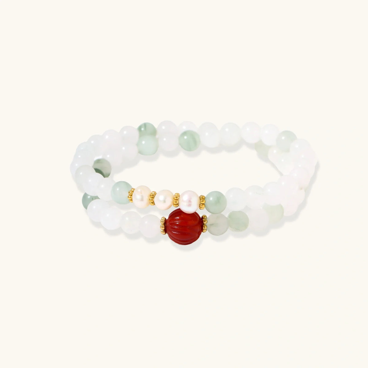 Triple-strand bracelet with Tianshan jade beads, freshwater pearls and a hand-carved jade flower charm.