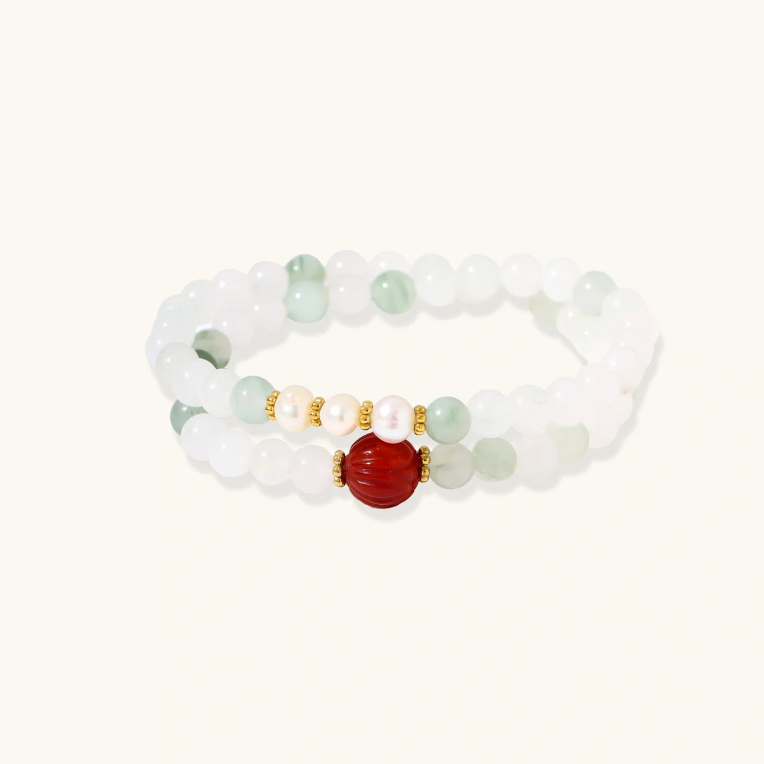Triple-strand bracelet with Tianshan jade beads, freshwater pearls and a hand-carved jade flower charm.