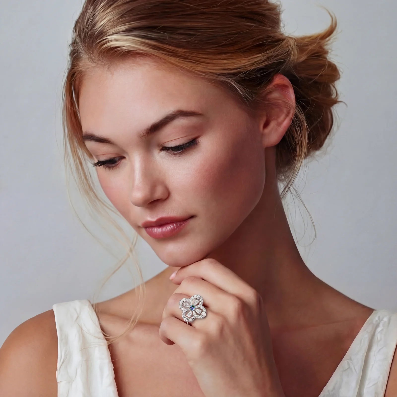 Sterling silver moissanite flower ring by Micoryan Jewellery.