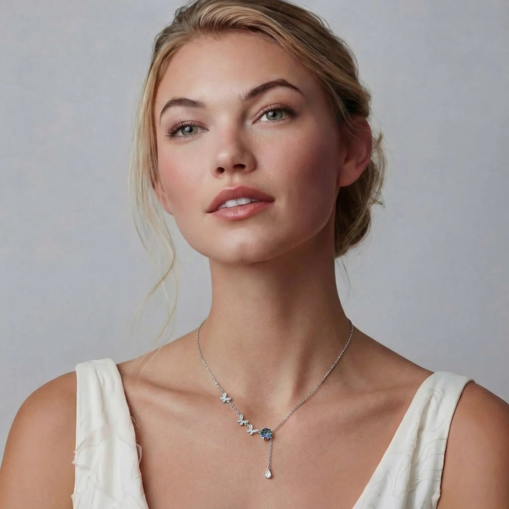 Butterfly moissanite necklace in sterling silver by Micoryan Jewellery.