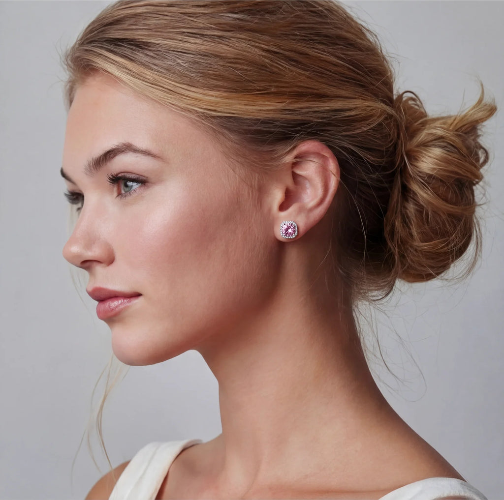 Pink moissanite halo stud earrings in sterling silver by Micoryan Jewellery.