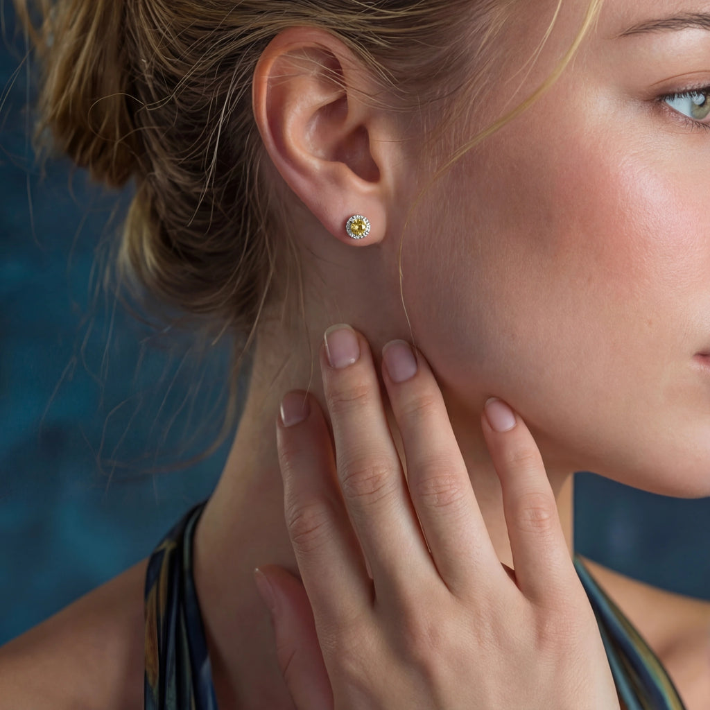 Yellow moissanite halo stud earrings in sterling silver by Micoryan Jewellery.