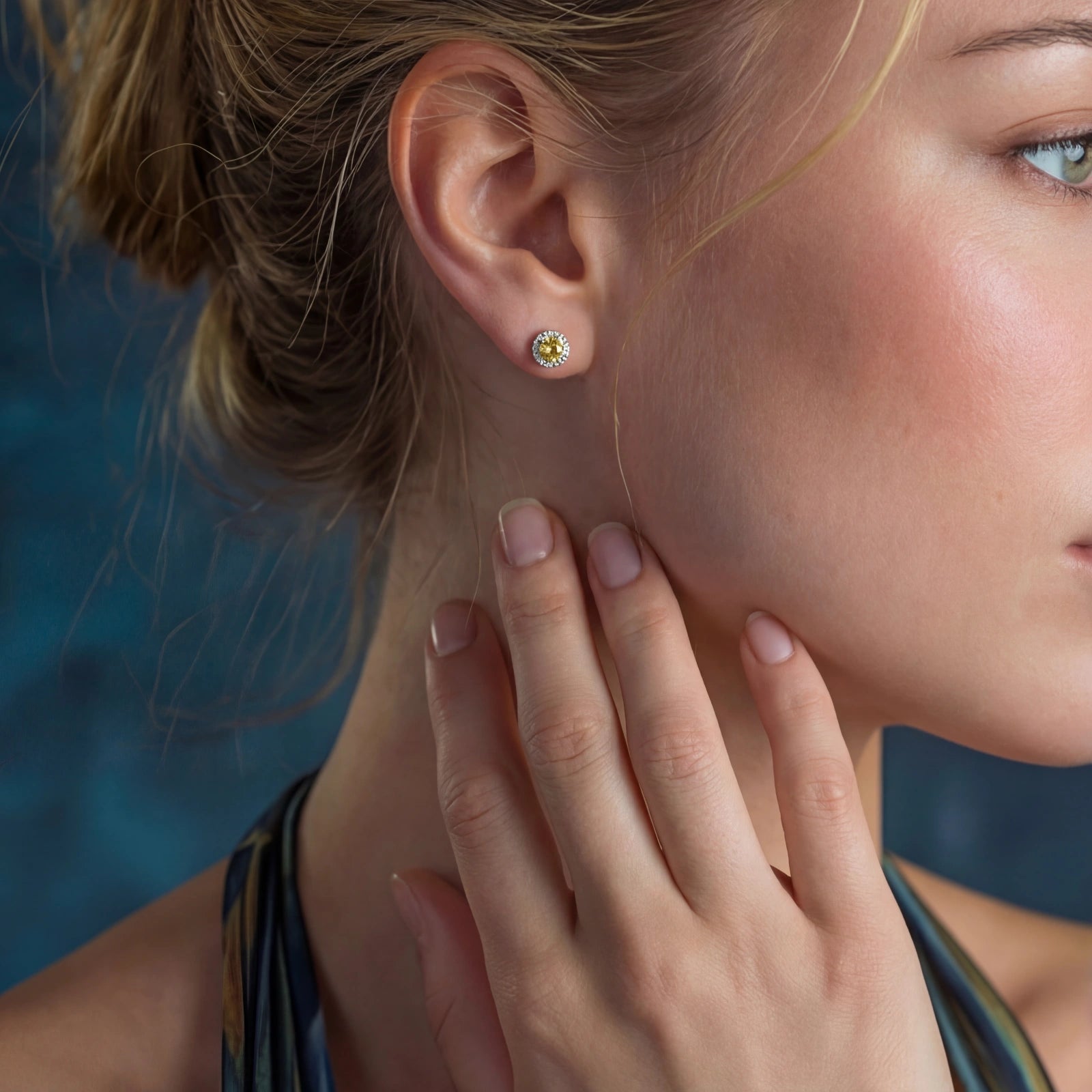 Yellow moissanite halo stud earrings in sterling silver by Micoryan Jewellery.