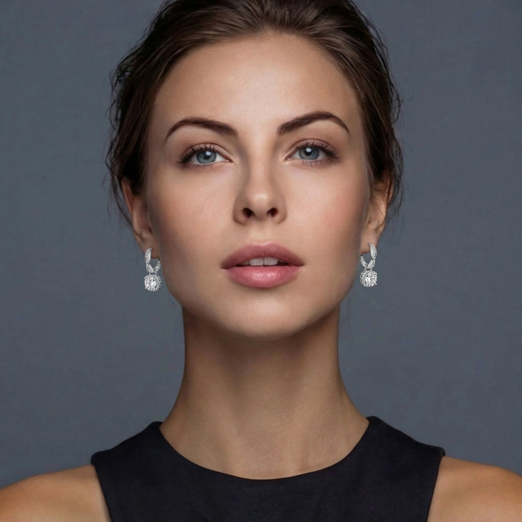 Twisted moissanite halo hoop earrings in sterling silver by Micoryan Jewellery.