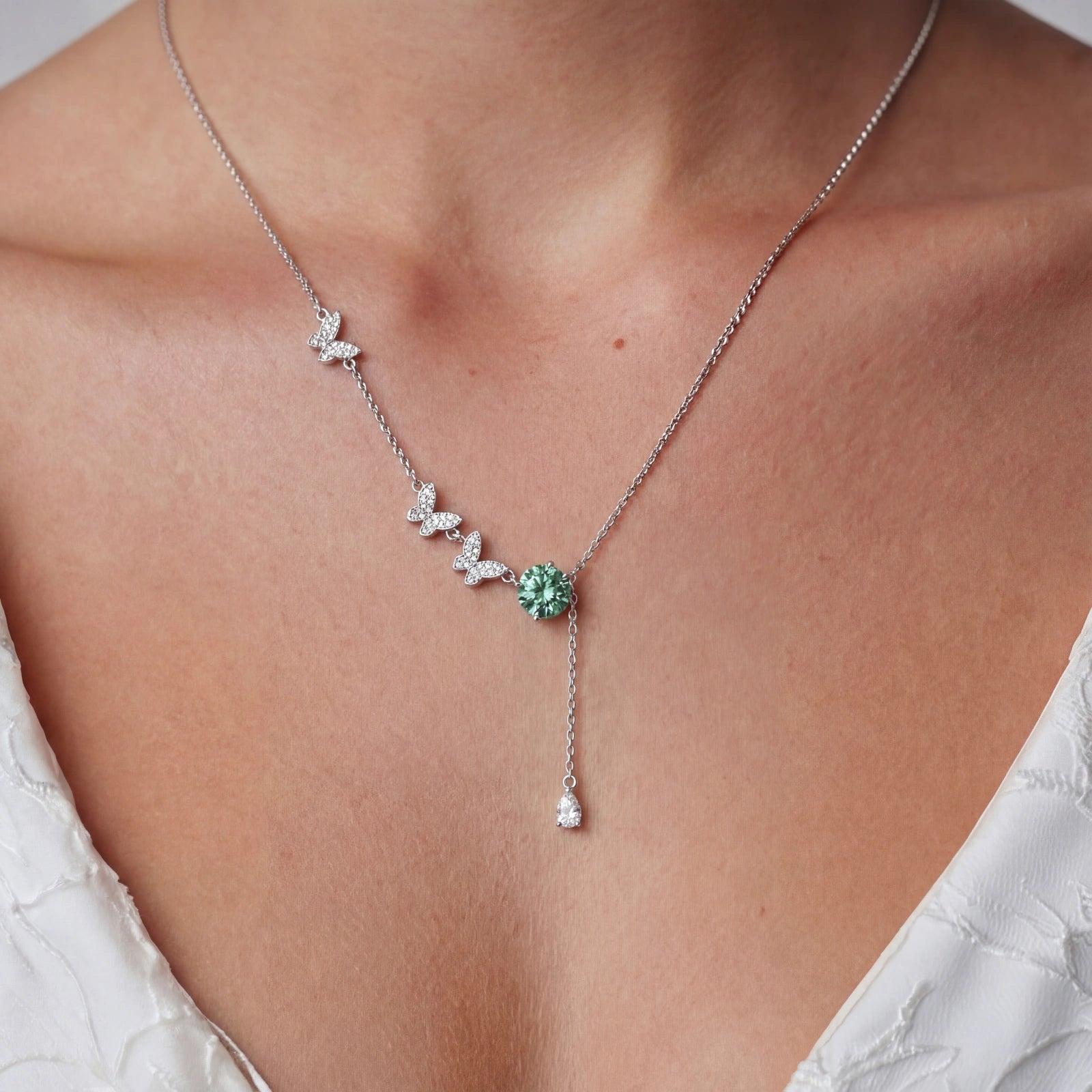 Butterfly moissanite lariat necklace in sterling silver by Micoryan Jewellery.
