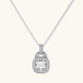 Sterling silver cushion halo pendant necklace featuring 2ct moissanite center stone with delicate box chain on neutral background.