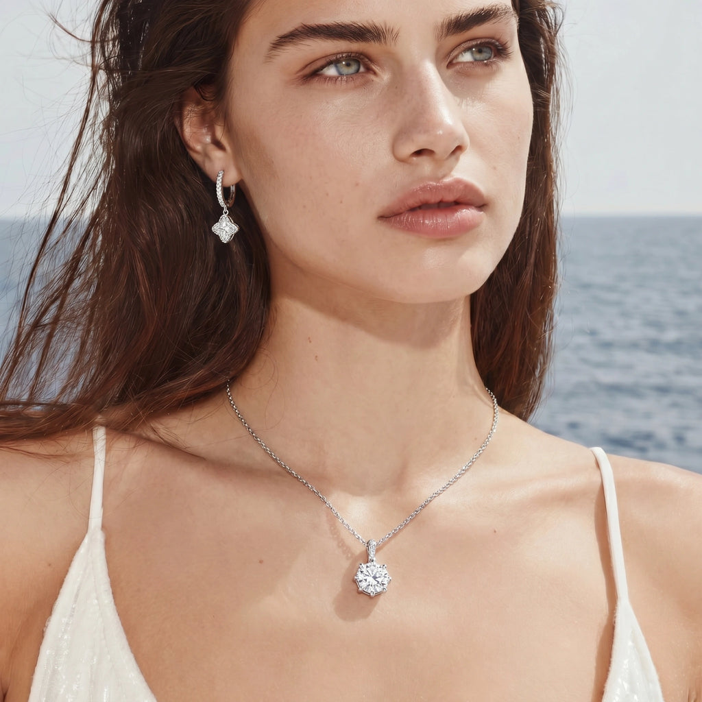 Moissanite huggie hoop earrings in sterling silver by Micoryan Jewellery.