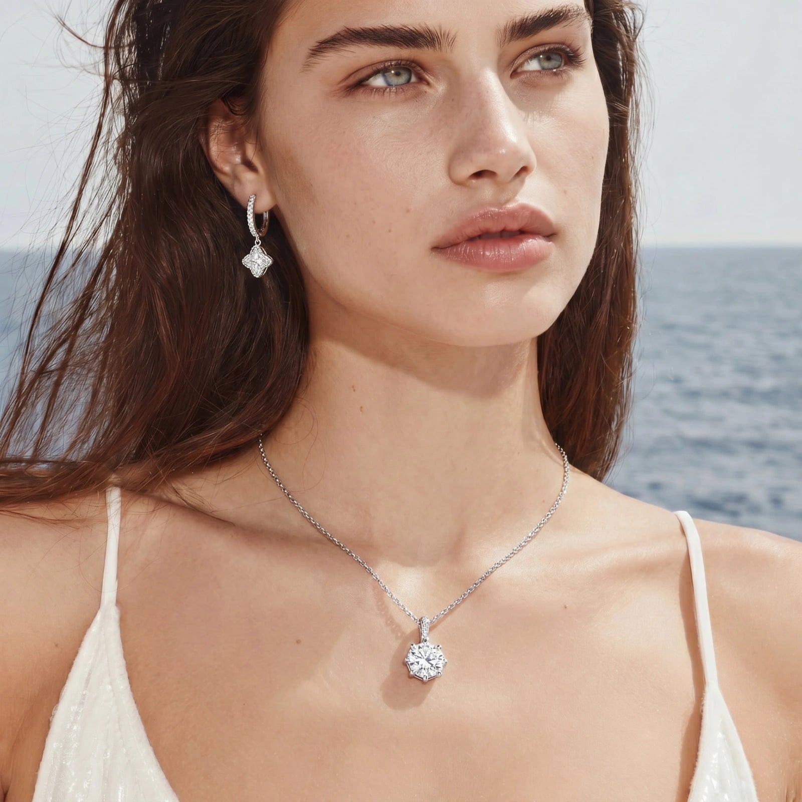 Moissanite huggie hoop earrings in sterling silver by Micoryan Jewellery.