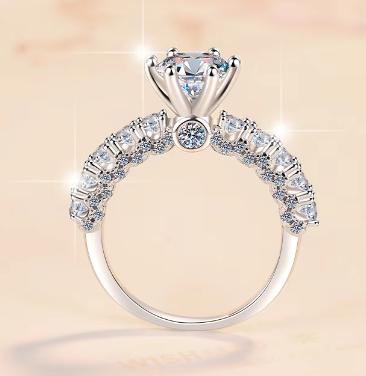 Round Solitaire Petal Side Stone Moissanite Ring in 925 Silver