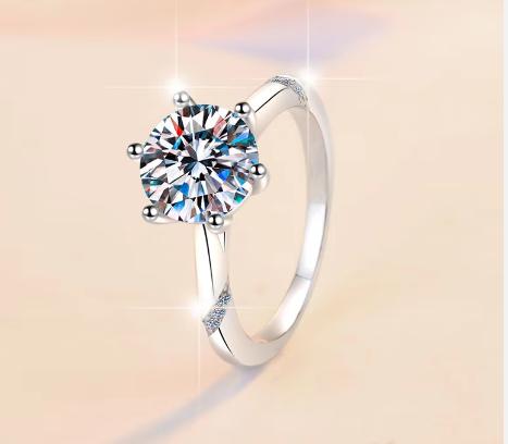 Round Solitaire Crossover Moissanite Ring in 925 Sterling Silver