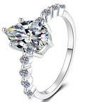 Pear Cut Side Stone Moissanite Ring in 925 Sterling Silver