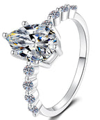 Pear Cut Side Stone Moissanite Ring in 925 Sterling Silver