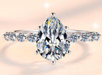 Pear Cut Side Stone Moissanite Ring in 925 Sterling Silver