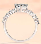 Pear Cut Side Stone Moissanite Ring in 925 Sterling Silver