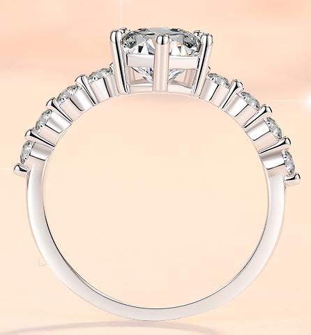 Pear Cut Side Stone Moissanite Ring in 925 Sterling Silver