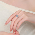 Pear Cut Side Stone Moissanite Ring in 925 Sterling Silver