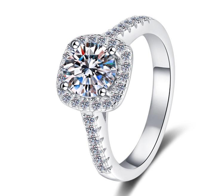 Round Twist Halo Moissanite Ring in 925 Sterling Silver