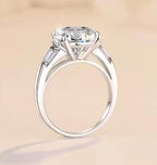 Round Solitaire Baguette Shoulder Moissanite Ring in 925 Silver
