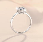 Round Solitaire Baguette Accent Moissanite Ring in 925 Sterling Silver