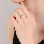 Round Solitaire Baguette Accent Moissanite Ring in 925 Sterling Silver