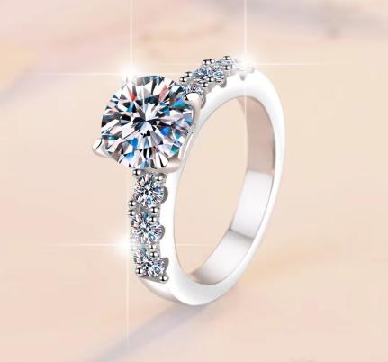 Round Solitaire Side Stone Moissanite Ring in 925 Sterling Silver