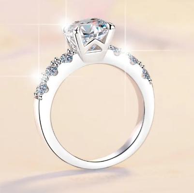 Round Solitaire Side Stone Moissanite Ring in 925 Sterling Silver