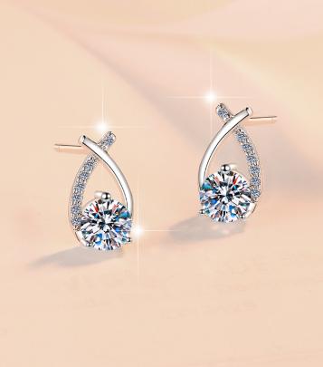 Round Solitaire Crossover Stud Moissanite Earrings in Sterling Silver