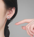 Pavé Circle Stud Moissanite Earrings in Sterling Silver