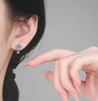 Round Halo Hinged Hoop Moissanite Earrings in Sterling Silver