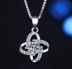 Four-Petal Solitaire Sterling Silver Moissanite Pendant, silver-tone
