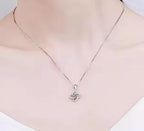 Four-Petal Solitaire Sterling Silver Moissanite Pendant, silver-tone