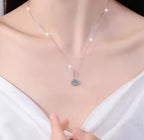 Long-Bail Halo Sterling Silver Moissanite Pendant, silver-tone