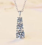 Graduated Three-Stone Drop Sterling Silver Moissanite Pendant, silver-tone