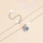 Crossed Ribbon Sterling Silver Moissanite Pendant, silver-tone