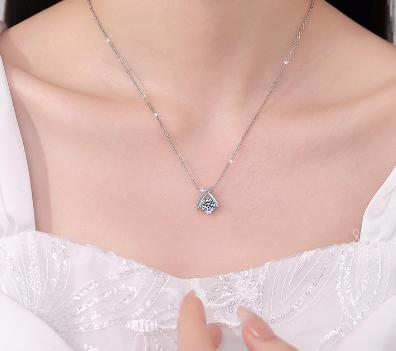 Crossed Ribbon Sterling Silver Moissanite Pendant, silver-tone