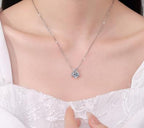 Crossed Ribbon Sterling Silver Moissanite Pendant, silver-tone