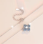 Petite Four-Petal Flower Sterling Silver Moissanite Pendant, silver-tone