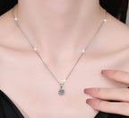 Sculpted-Prong Solitaire Sterling Silver Moissanite Pendant, Silver-tone
