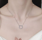 Open Circle Sterling Silver Moissanite Pendant, Silver-tone
