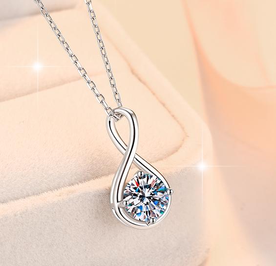 Sweeping Teardrop Solitaire Sterling Silver Moissanite Pendant, Silver-tone