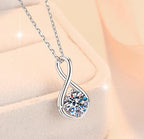 Sweeping Teardrop Solitaire Sterling Silver Moissanite Pendant, Silver-tone
