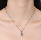 Sweeping Teardrop Solitaire Sterling Silver Moissanite Pendant, Silver-tone