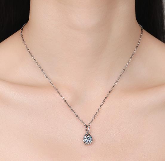 Sweeping Teardrop Solitaire Sterling Silver Moissanite Pendant, Silver-tone
