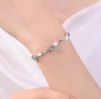 Sterling Silver Moissanite Triple Flower Station Bracelet, detail view 3