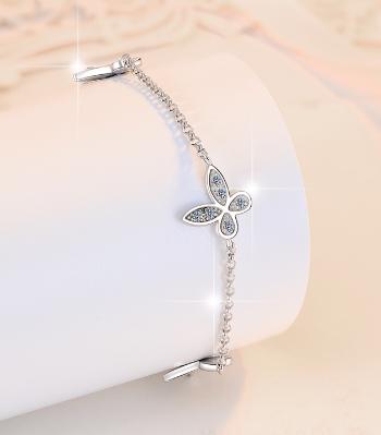 Sterling Silver Moissanite Four Petal Flower Station Bracelet, detail view 2