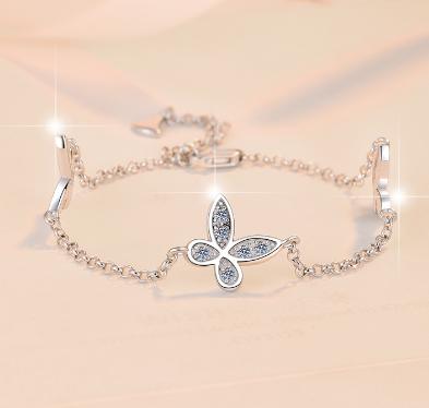 Sterling Silver Moissanite Four Petal Flower Station Bracelet, detail view 1